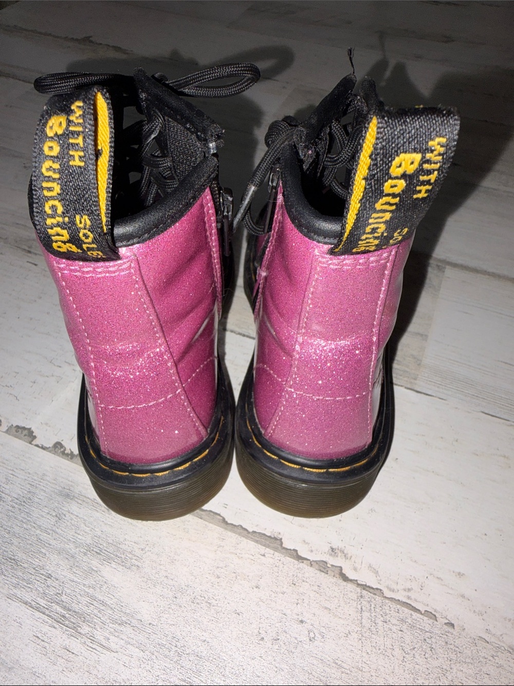 Dr. Martens Pink Glitter 8-Eye Lace-Up Boots with Black Soles - Picture 5 of 9